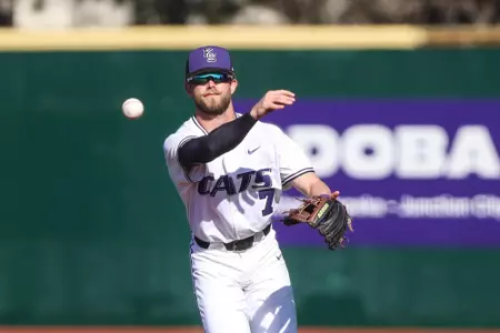 Jake Biller throws to first vs. La Salle