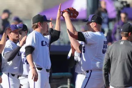 Kasey Ford high fives his teammates vs. La Salle