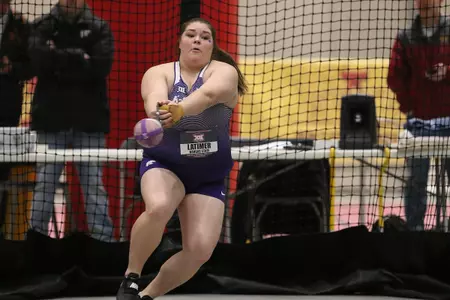 Taylor Latimer of Kansas State competes in the womens weight throw at the 2018 Big 12 Indoor Track and Field Championships in Ames, Iowa.