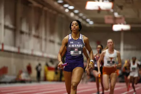 Keiteyana Parks of Kansas State competes in the womens Distance Medley Relay at the 2018 Big 12 Indoor Track and Field Championships in Ames, Iowa.