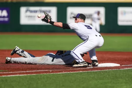 Trent McMaster catches a pick-off throw vs. La Salle