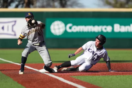 Will Brennan slides into third base vs. La Salle