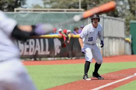 Will Brennan watches a swing before scoring on a sacrifice fly vs. Baylor at Tointon Family Stadium on April 28, 2018.