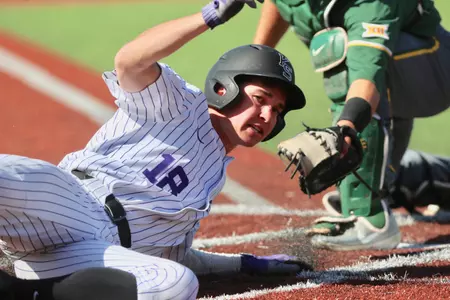 Will Brennan slides into home but is called out vs. Baylor at Tointon Family Stadium on April 28, 2018.