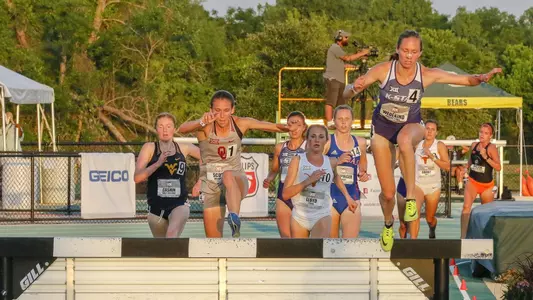 Tackeling the first water jump in the Womens 3000m Steeplechase  at the 2018 Big 12 Track and Field Championship at Clyde Hart Stadium in Waco, TX  on Saturday, May 12, 2018