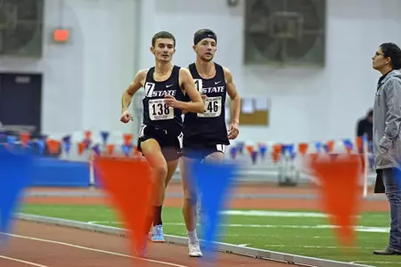 K-State's Kerby Depenbusch and Joe Gorthy compete in the 3000 meters during the KU-KSU-WSU Triangular at Anschutz Pavilion in Lawrence, Kansas.