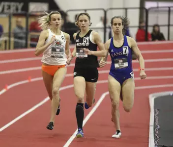 Oklahoma State SR Abbie Hetherington, K-State SO Kassidy Johnson and Univ of Kansas FR Ally Ryan competing in the W 1000m Run at  the 2019 Big 12 Indoor Track and Field Championship at the Sports Performance Center at Texas Tech University on Friday, February 22, 2019