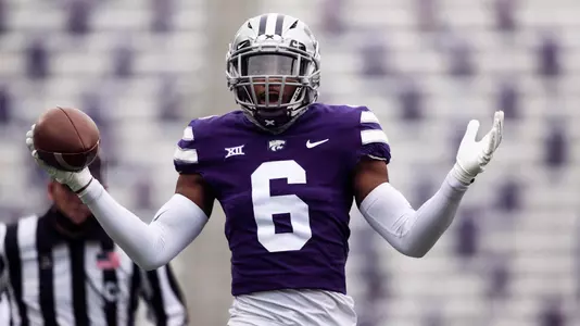 Justin Gardner reacts after grabbing a pick six against Kansas