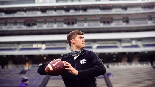 Will Howard warms up before K-State faces Kansas