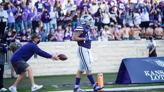 Briley Moore celebrates after scoring a touchdown against Texas Tech