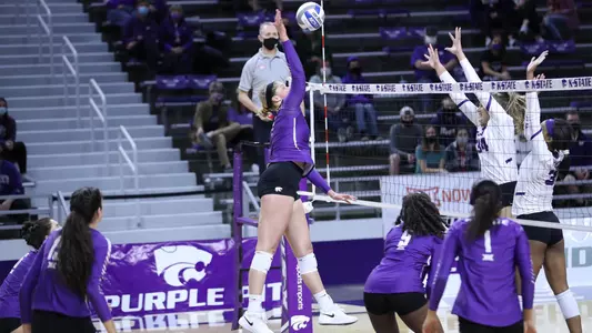 Brynn Carlson goes up for a kill against TCU