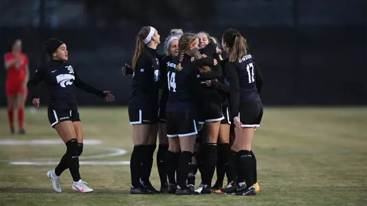 K-State Soccer players hug Avery Green after she subs out against Texas Tech