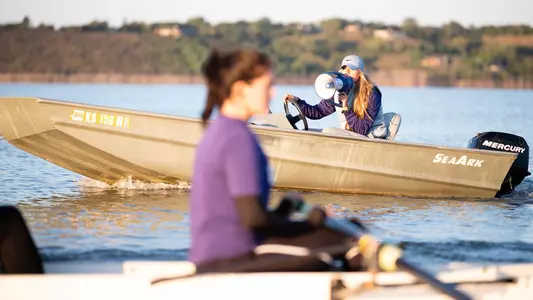 Noelle Dykmann supervises a morning practice at Tuttle Creek Lake