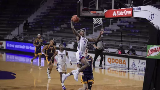 DaJuan Gordon goes up for a dunk against Kansas City