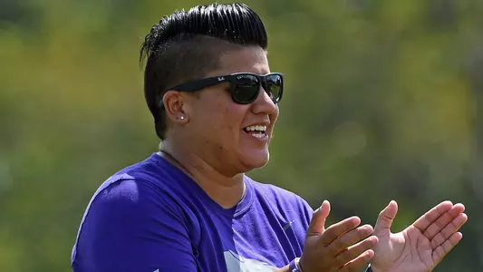 K-State's coach Kat Benton watches the match against South Dakota State at Buser Family Park in Manhattan, Kansas.