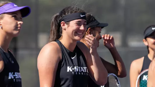 Maria Linares laughs during a K-State Tennis photoshoot in Manhattan