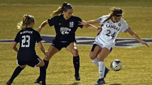 K-State's Kursten von Klahr and Emily Crain compete against Kansas at Buser Family Park in Manhattan, Kansas on March 6, 2021.