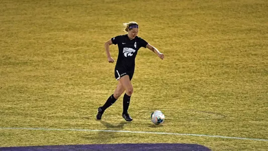 K-State's Aliyah El-Nagger competes against Kansas at Buser Family Park in Manhattan, Kansas on March 6, 2021.