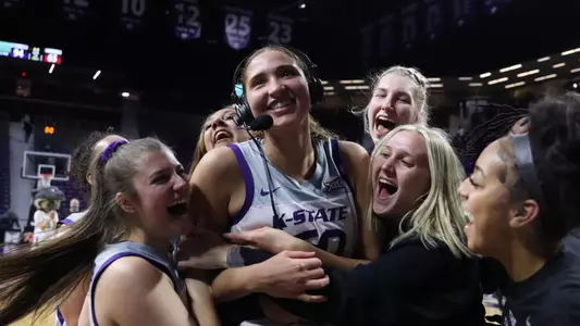 K-State celebrates with Ayoka Lee after her record setting performance