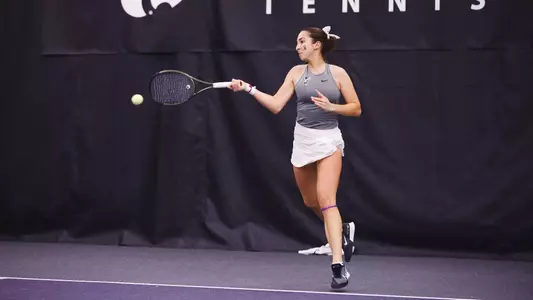 Maria Santos against Fordham on Feb. 17 at Body First Tennis Center