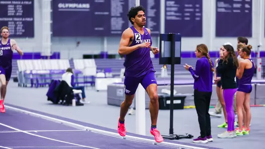 Alex Gutierrez running the 1000 meters during the Steve Miller Invitational at K-State indoor track and field complex