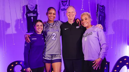 Temira Poindexter with Coach Mittie, Coach Gregorio and Coach Gilliam