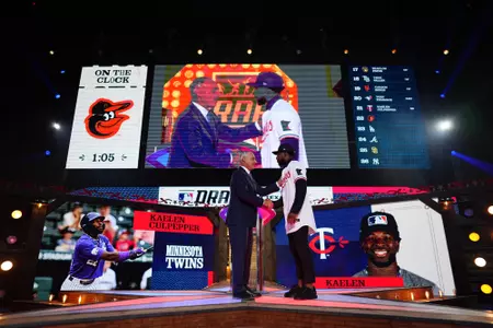 FORT WORTH, TX - JULY 14:  Kaelen Culpepper greets Major League Baseball commissioner Robert D. Manfred Jr. after being drafted by the Minnesota Twins with the 21st pick of the first round  during the 2024 MLB Draft presented by Nike at Cowtown Coliseum on Sunday, July 14, 2024 in Fort Worth, Texas. (Photo by Daniel Shirey/MLB Photos via Getty Images)