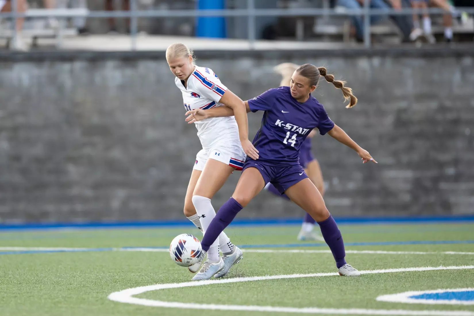 Reece Walrod fights for the ball at UMass Lowell.