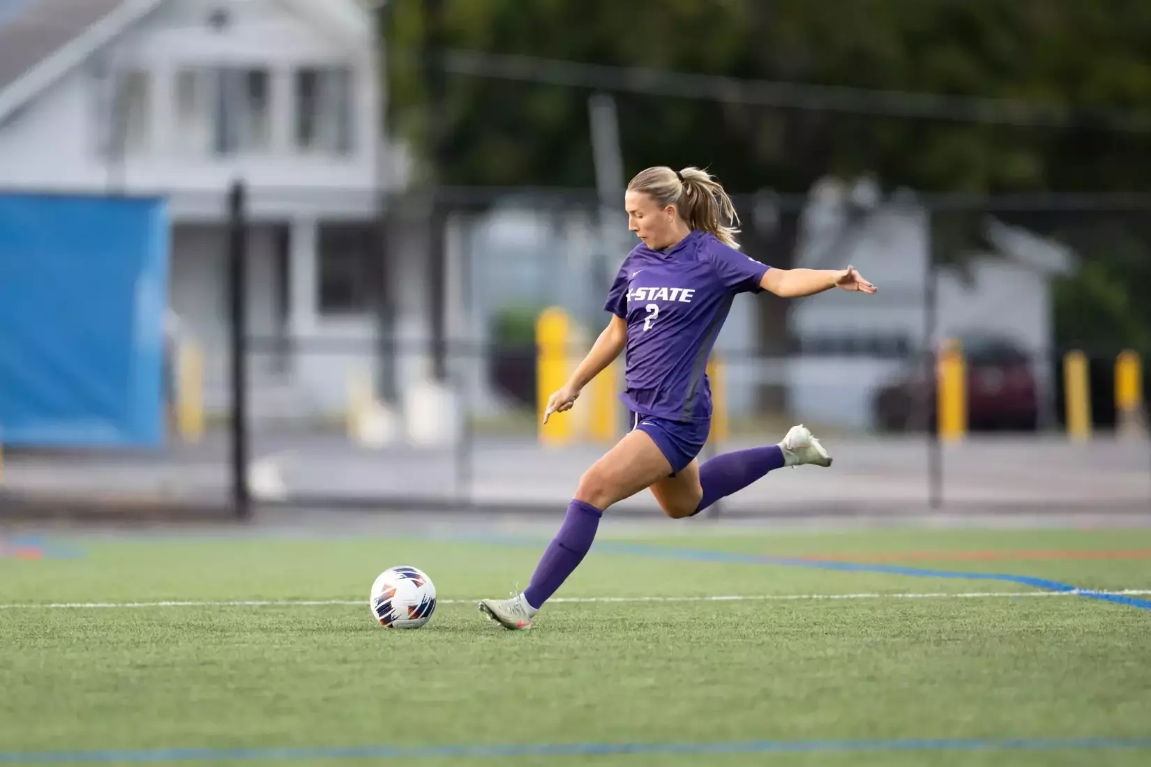 Lily Hendrickson sends the ball down field at UMass Lowell.