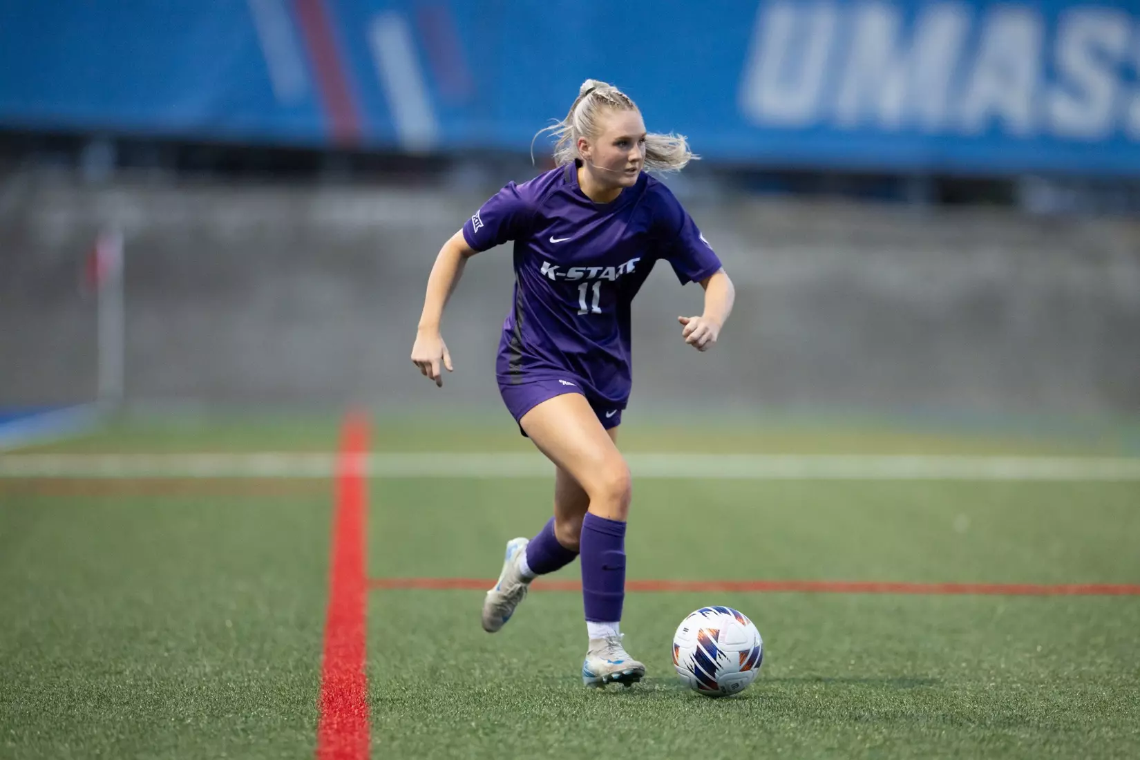 Emerson DeLuca looks to advance the ball at UMass Lowell.