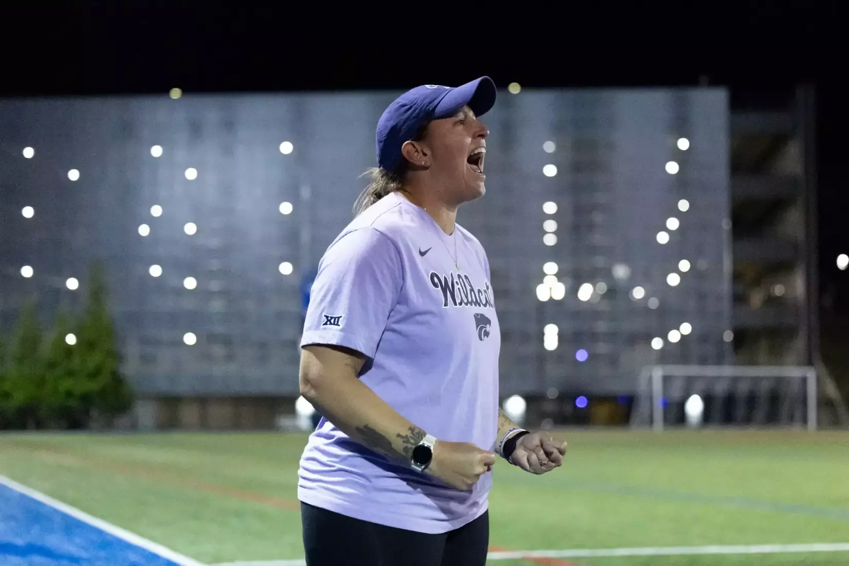 K-State head coach Colleen Corbin shouts encouragement to her team at UMass Lowell.