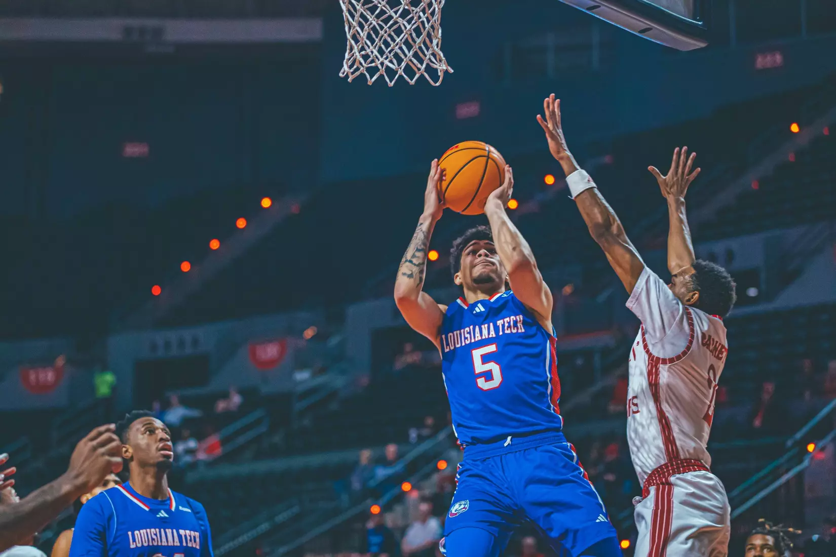 Bulldogs beat rival Cajuns, 69-58