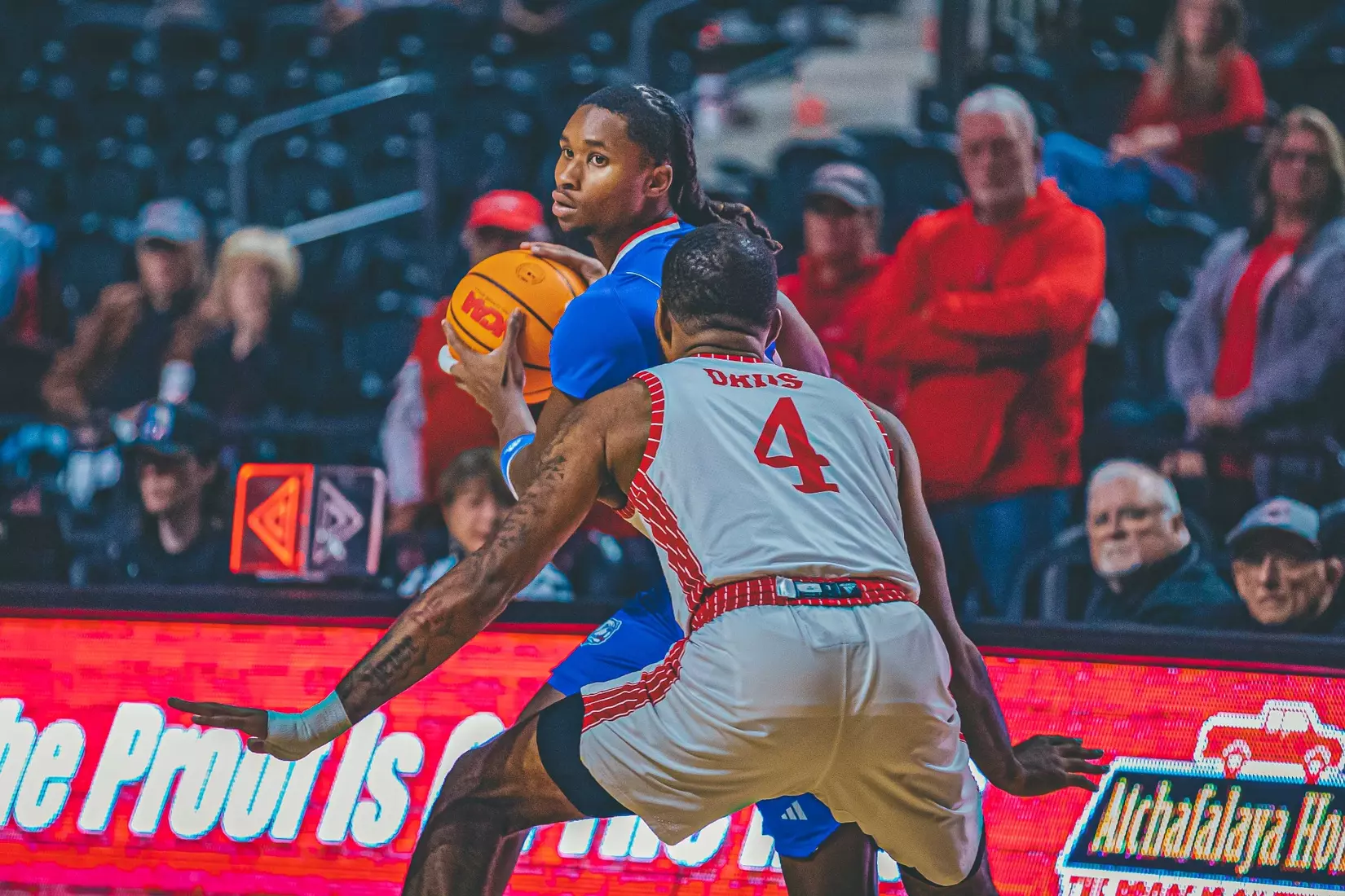 Bulldogs beat rival Cajuns, 69-58