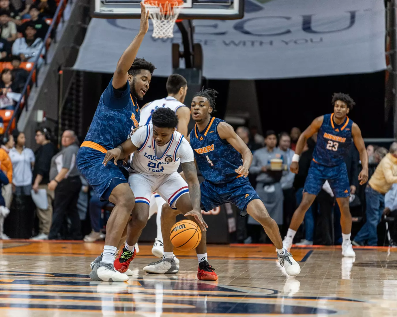 Bulldogs down Miners, 65-59