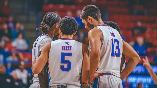 Team huddle WKU