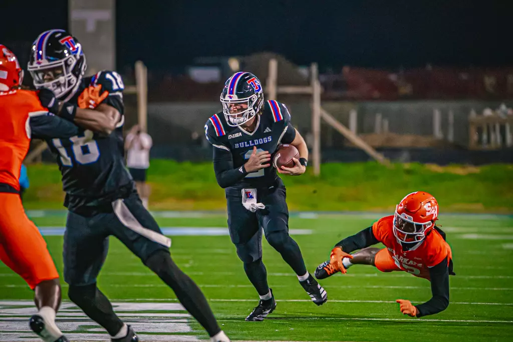 Bulldogs haunt the Bearkats, win 55-14 on Halloween night