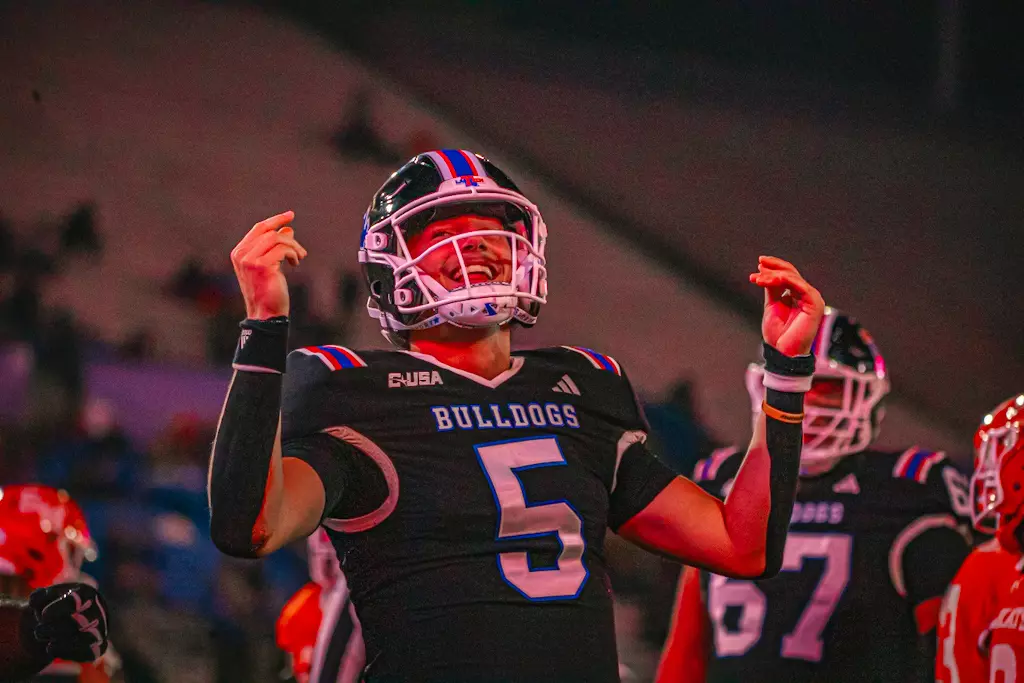 Bulldogs haunt the Bearkats, win 55-14 on Halloween night