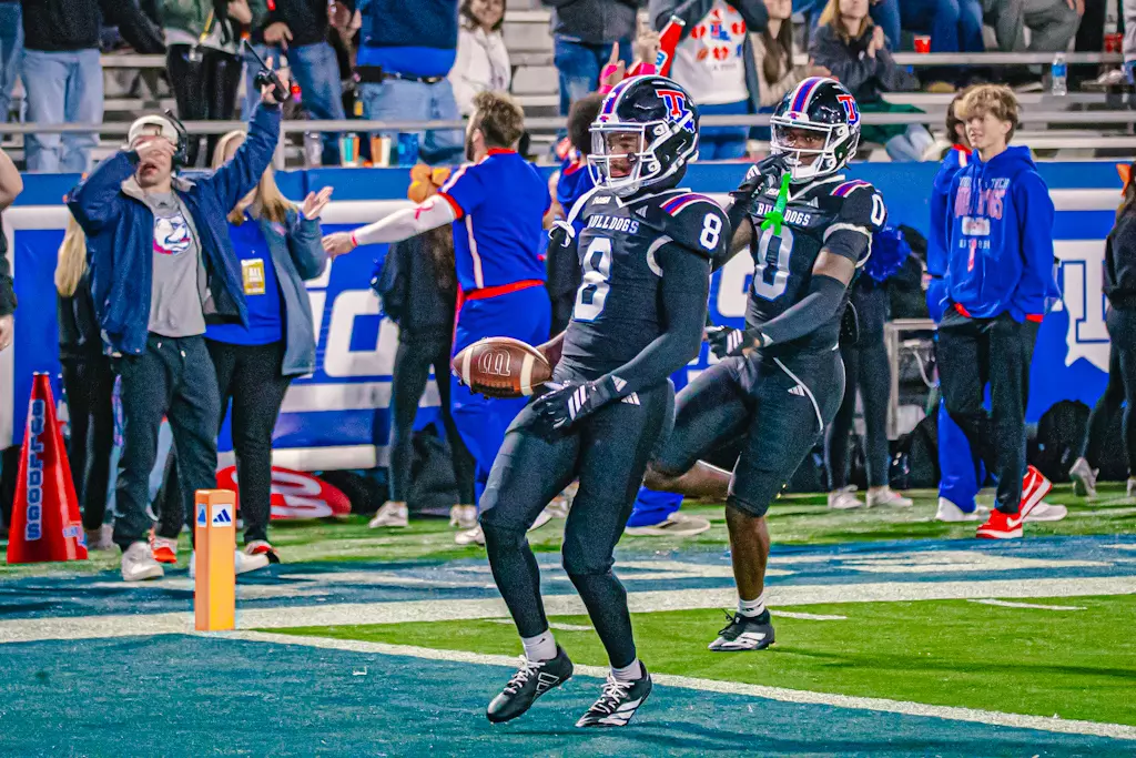 Bulldogs haunt the Bearkats, win 55-14 on Halloween night