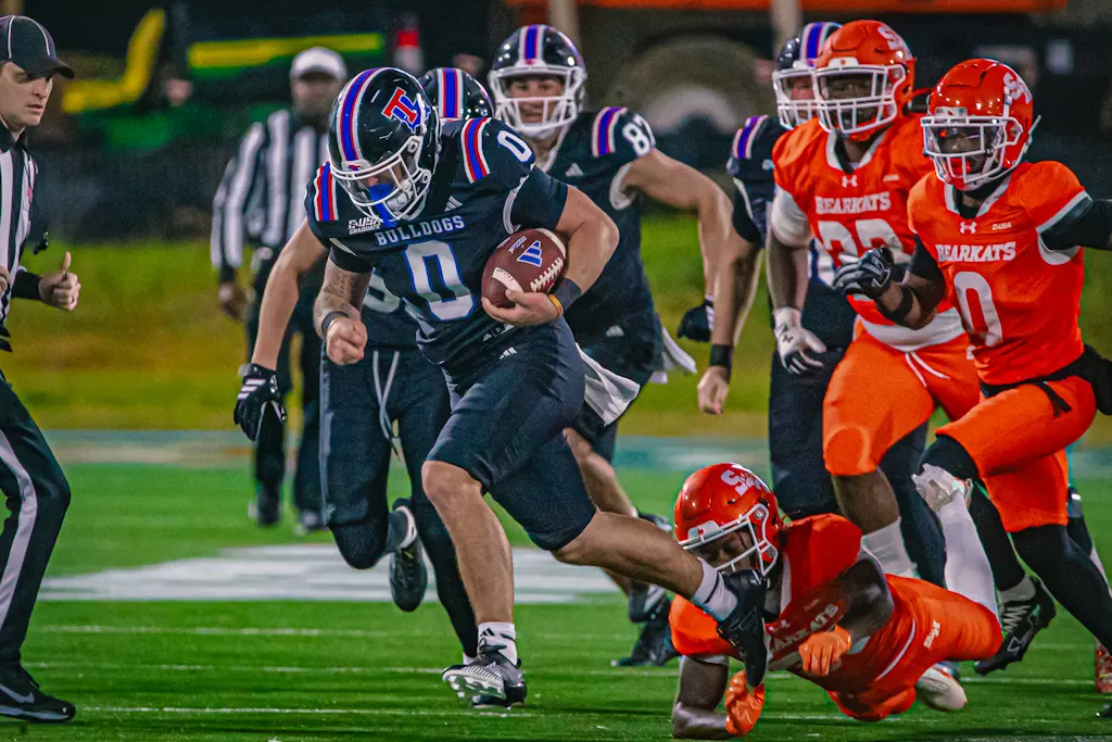 Bulldogs haunt the Bearkats, win 55-14 on Halloween night