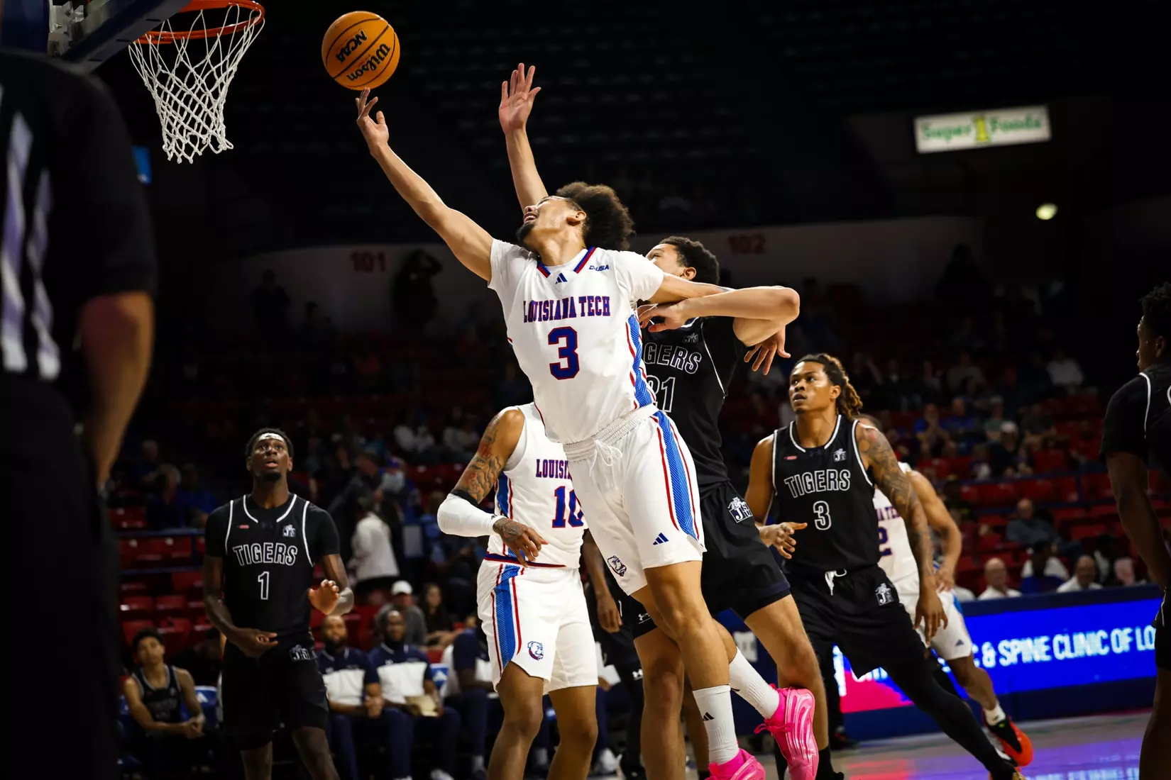 Bulldogs clamp down defensively, defeat Tigers 68-51