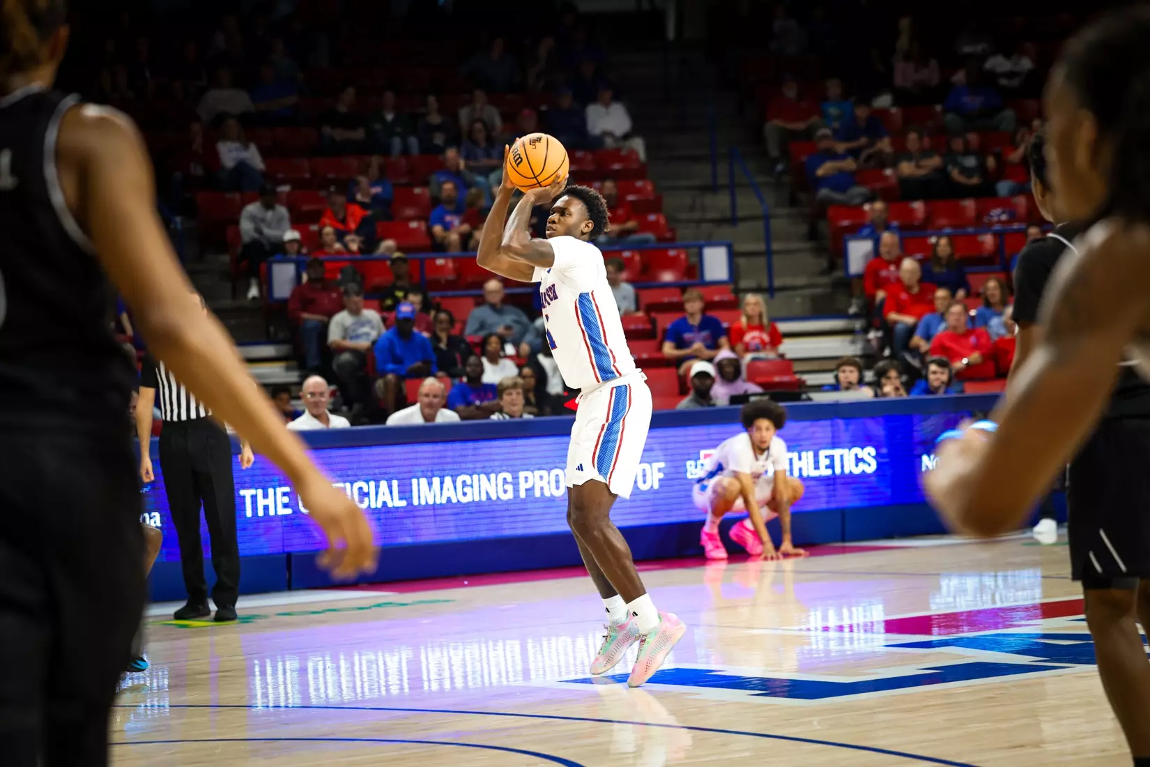 Bulldogs clamp down defensively, defeat Tigers 68-51