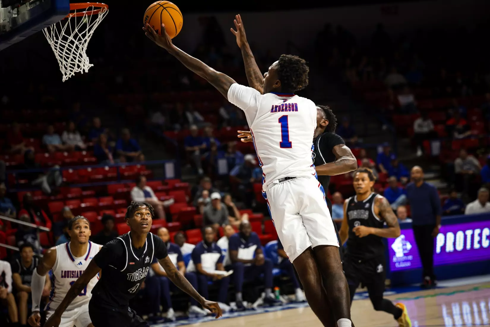 Bulldogs clamp down defensively, defeat Tigers 68-51