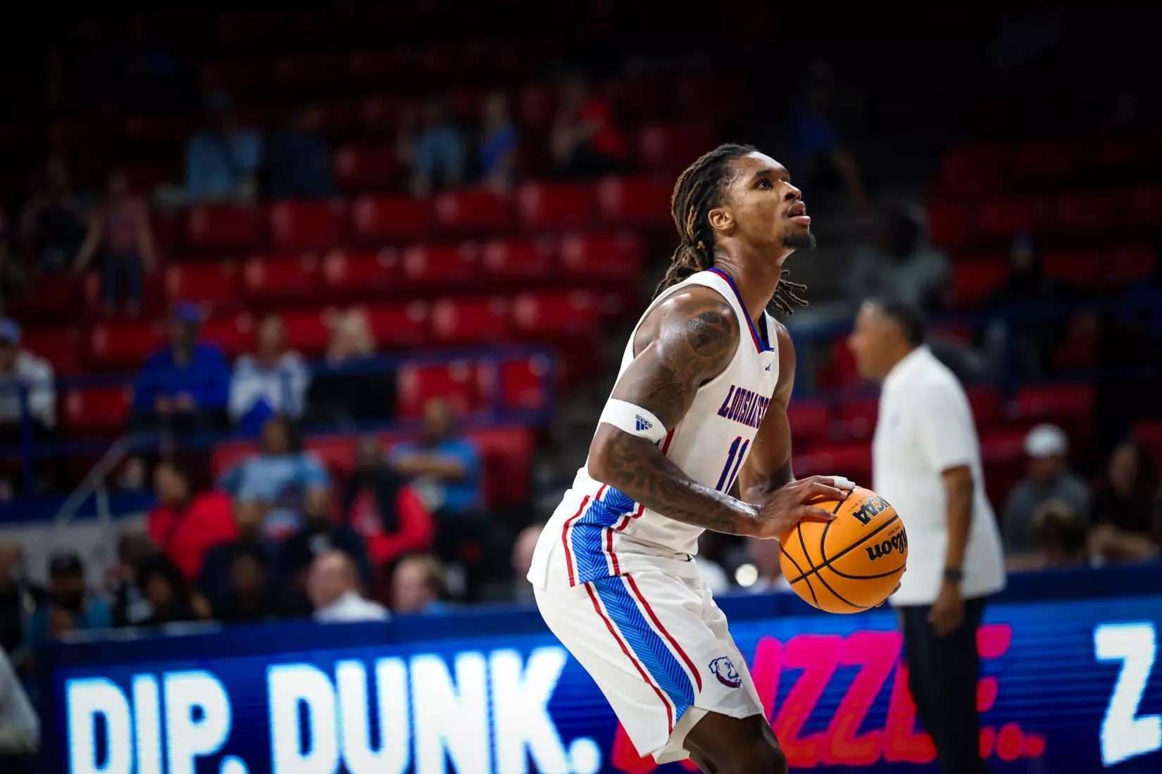 Bulldogs clamp down defensively, defeat Tigers 68-51