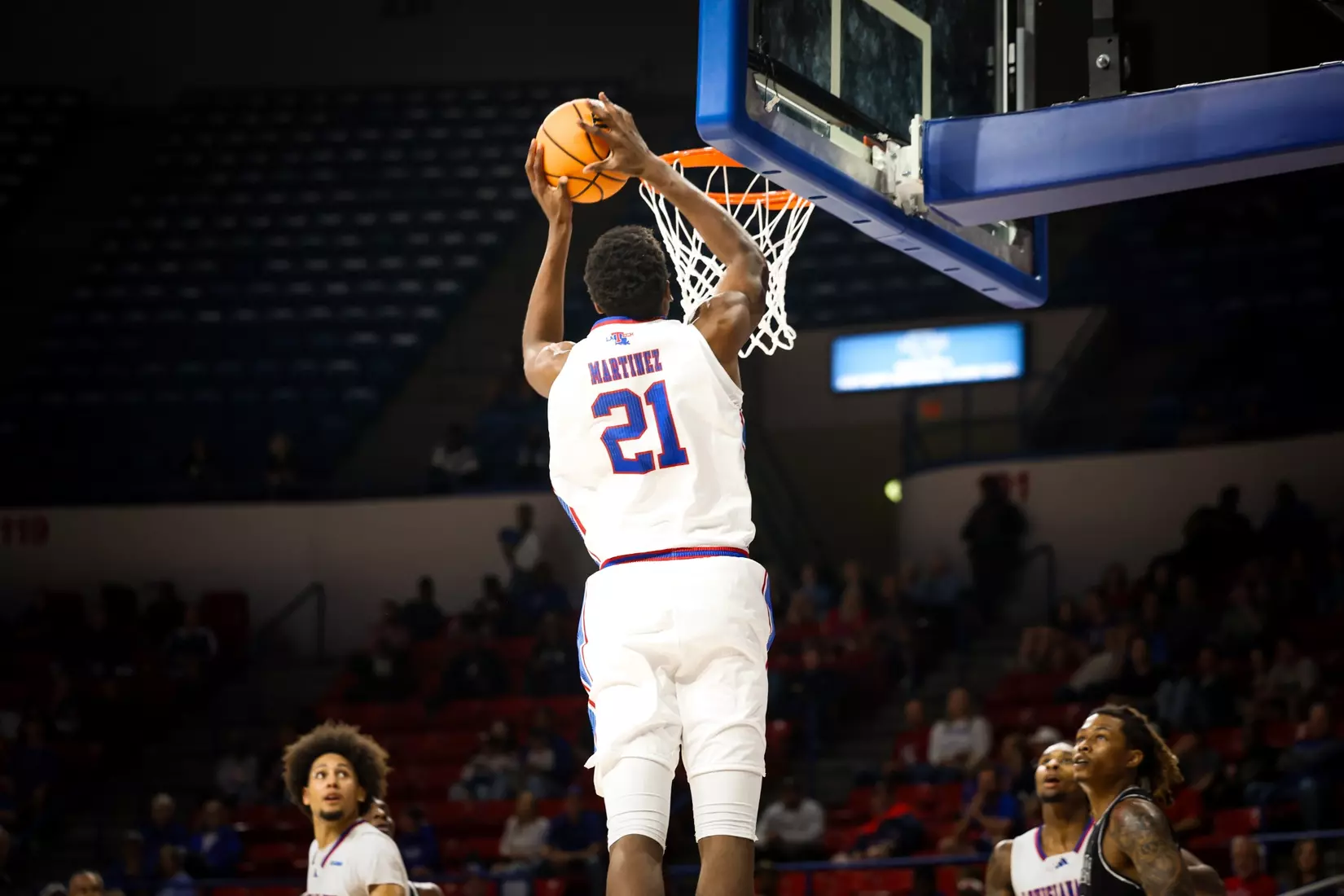Bulldogs clamp down defensively, defeat Tigers 68-51