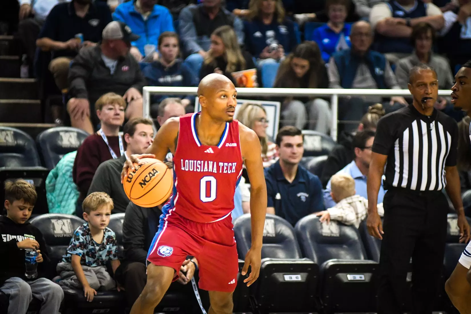 Bulldogs fall 77-50 in season opener to Wolf Pack