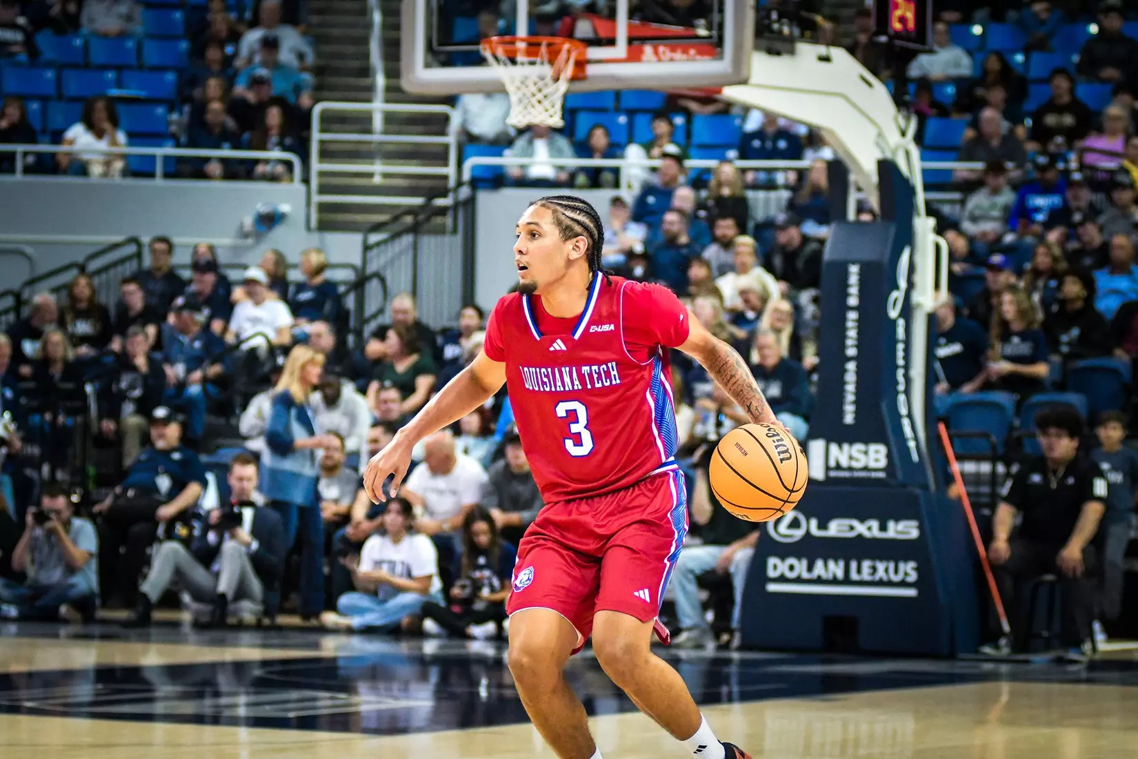 Bulldogs fall 77-50 in season opener to Wolf Pack