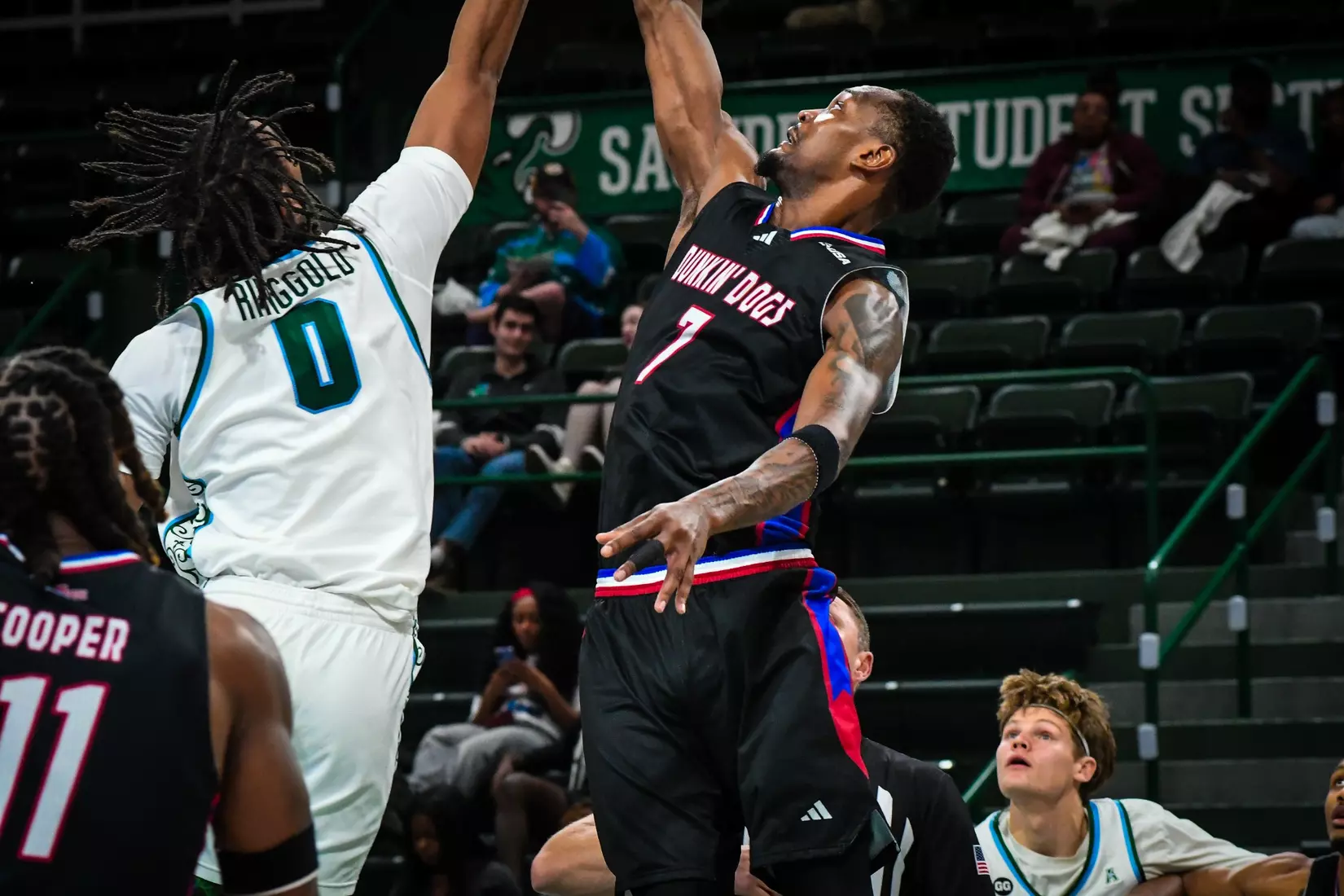 Bulldogs fall on the road to Green Wave, 61-53