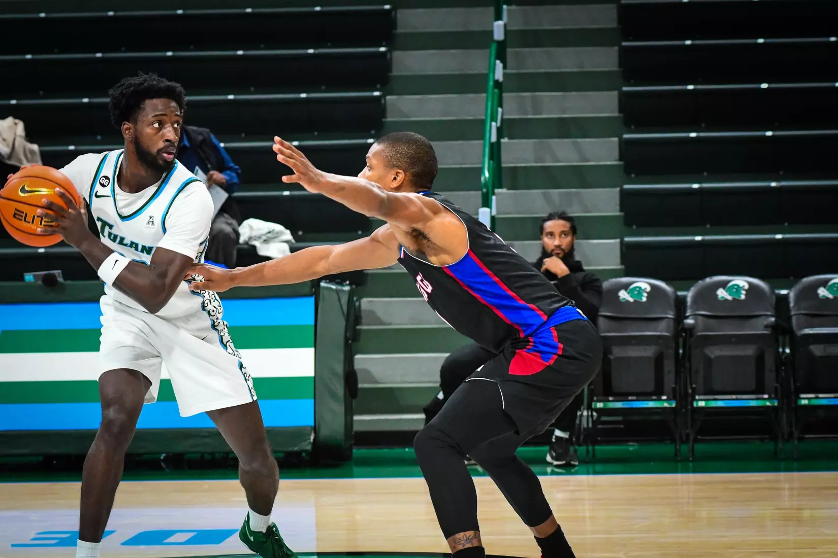 Bulldogs fall on the road to Green Wave, 61-53