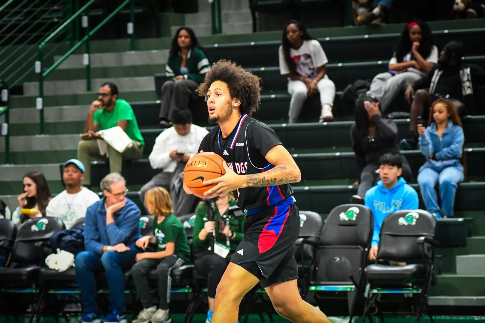 Bulldogs fall on the road to Green Wave, 61-53
