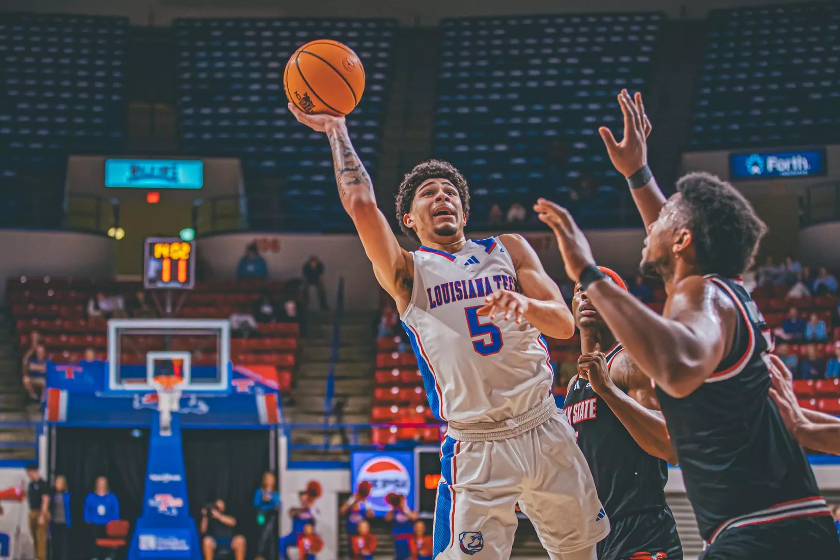 Bulldogs edged by Gamecocks, 70-68, in the TAC